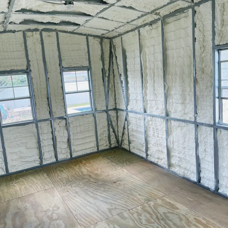 Closed-cell spray foam insulation applied to wall cavities in a residential project in Franklin Lakes